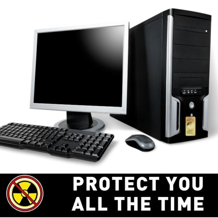 Desktop computer with monitor, keyboard, and mouse on a white background.