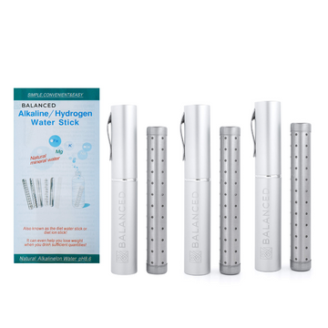 Set of silver water sticks with packaging labeled 'Balanced' on a white background