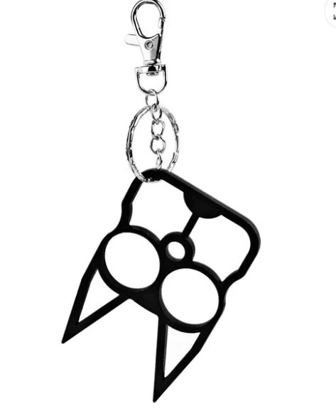 A keychain with a fox head design that appears to be a self-defense tool, in black color.